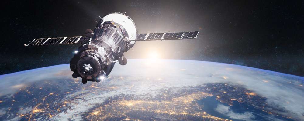 AdobeStock_329832308, Spacecraft in orbit over earth