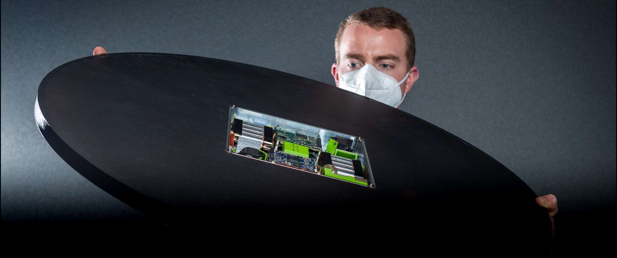 Aerospace's DiskSat is a plate-shaped satellite (1 meter in diameter, 2.5 centimeters thick) that could provide the required power and aperture needed for future missions.