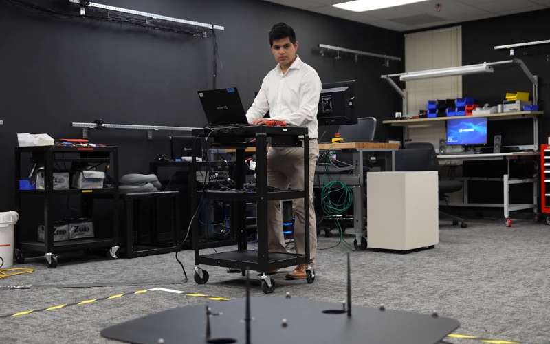Juan Rodriguez in the CAVE lab.