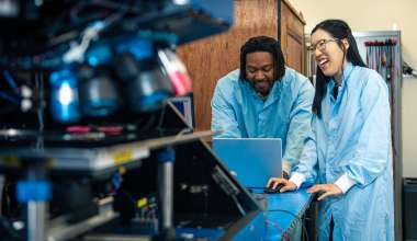 Lab with two people working